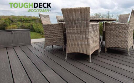 Anthracite Woodsman + WPC Decking with Glass Balustrade & Contrasting Rattan Garden Furniture