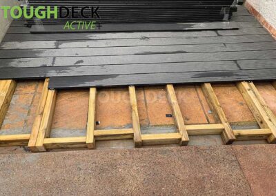 Tough Decking Charcoal Active + Being Installed On To Timber Frame
